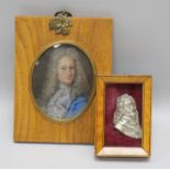 A silver? portrait relief of Charles II? and an oil on copper portrait of an early 18th C gentleman