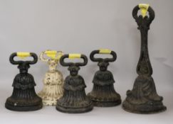 Five cast iron doorstops H.35cm.