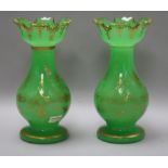 A pair of Victorian green glass vases H.20cm