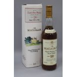 A bottle of McCallan 10 year old Scotch whisky