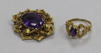 A Victorian yellow metal and amethyst brooch and a similar ring.