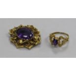 A Victorian yellow metal and amethyst brooch and a similar ring.