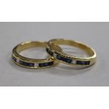 A pair of 14ct gold, channel set sapphire and diamond rings, size V.