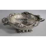 A mid 19th century Austrian pierced silver two handled fruit bowl, 26.5cm over handles, 12.5 oz.