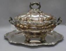 A silver plated tureen and stand width 49cm height 33cm