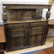 A 17th century style oak court cupboard W.138cm.