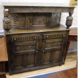 A 17th century style oak court cupboard W.138cm.