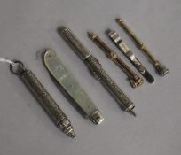 Two white metal and two yellow metal propelling pencils, a silver fruit knife and a silver tie