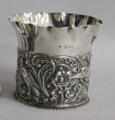 A Victorian repousse silver bottle coaster by William Comyns, London, 1892, 97mm, 4.5 oz.