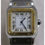 A gentleman's bi-metallic Cartier Santos automatic wrist watch, with Roman dial and date aperture,