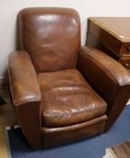 A pair of 1940's leather club armchairs