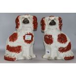 A pair of Staffordshire spaniels H.29cm.