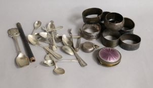 Five silver napkin rings, a silver sovereign case and a small quantity of small silver flatware