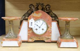 A rouge marble figurative Art Deco clock garniture clock width 30cm height 26cm