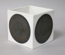 A Troika cube pot, decorator's mark for Anne Lewis