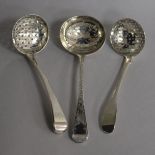 Three assorted early 19th century silver sifter ladles, 4.5 oz