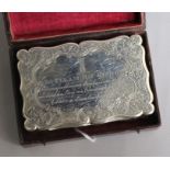 A cased Victorian engraved silver snuff box, Edward Smith, Birmingham 1849, 92mm.