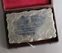 A cased Victorian engraved silver snuff box, Edward Smith, Birmingham 1849, 92mm.