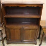 A mahogany bookcase/cupboard W.91cm.