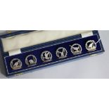 A cased set of six modern silver hunting related menu holders, J.A. Campbell, London, 1983/4, base