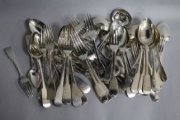 A harlequin part canteen of mainly 19th century Scottish silver fiddle pattern flatware with