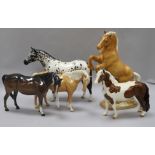 A collection of Beswick Horses. Welsh Cob Palomino 1014. Mare Palomino 1812, Brown Mare 1812,