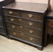 A George III oak chest of drawers W.98cm