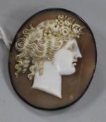 A 19th century white metal mounted oval cameo brooch, carved with the bust of a lady, 48mm