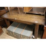 An oak rustic dining table W.140cm