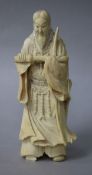 A Japanese ivory figure of an archer