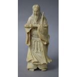 A Japanese ivory figure of an archer