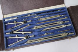A set of drawing instruments by W.H Harling, cased
