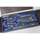 A set of drawing instruments by W.H Harling, cased