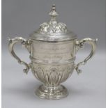 A silver "Faulkner Commemoration" miniature trophy cup and cover by William Comyns & Sons, London,