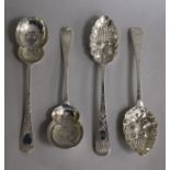 A pair of Victorian Irish silver 'berry' spoons, Philip Weekes, Dublin, 1845 and a later pair of