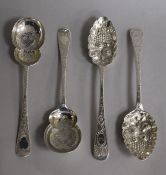 A pair of Victorian Irish silver 'berry' spoons, Philip Weekes, Dublin, 1845 and a later pair of