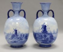 A pair of Doulton blue and white vases height 23cm