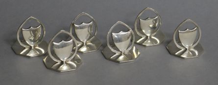 A set of six Edwardian silver menu holders with shield motifs, Horace Woodward & Co Ltd, Birmingham,