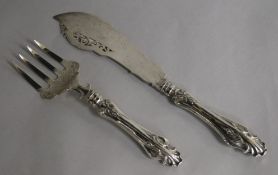 A pair of Victorian silver fish servers, George Unite, Birmingham, 1860, knife 30cm.