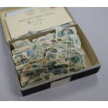 A stamp album and loose stamps