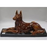 An Art Deco ceramic model of a dog width 52cm height 30cm
