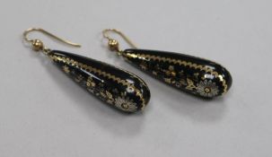 A pair of early 20th century yellow metal and tortoiseshell pique teardrop shaped earrings, 41mm