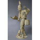 A Japanese ivory figure of a fisherman