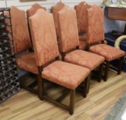 A set of seven oak dining chairs