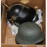 Five German helmets