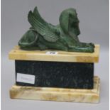 A Sphinx on marble base width 25cm height 25cm