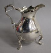 A George II silver cream jug, London, 1742, 10.8cm.