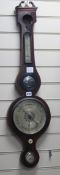 A Regency mahogany wheel barometer W.27cm