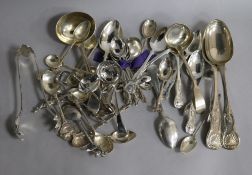 A quantity of assorted silver and plated flatware including silver sauce ladle and silver table