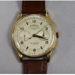 A gentleman's Coresa 18ct gold chronograph wrist watch.
